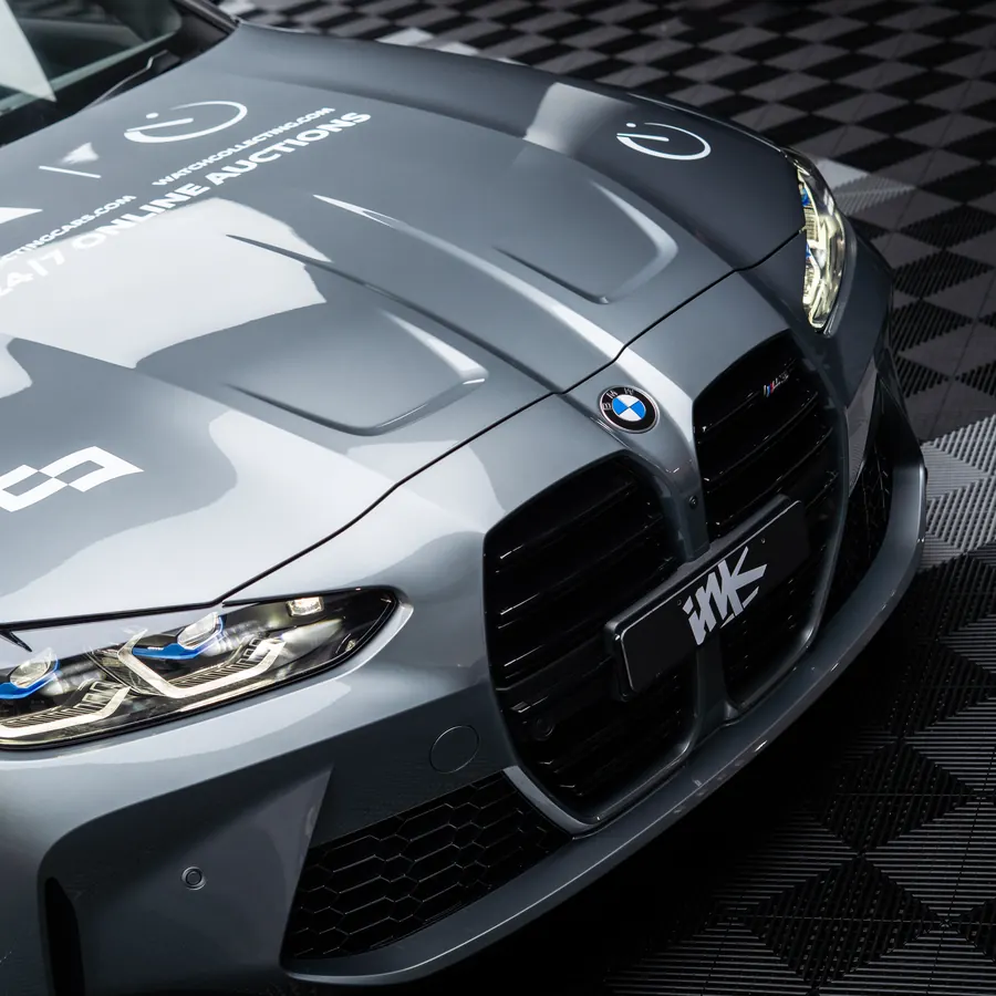 BMW M4 — front three-quarter
