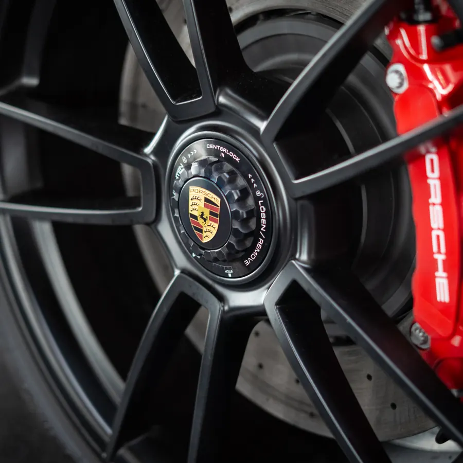 Porsche brake caliper — close detail