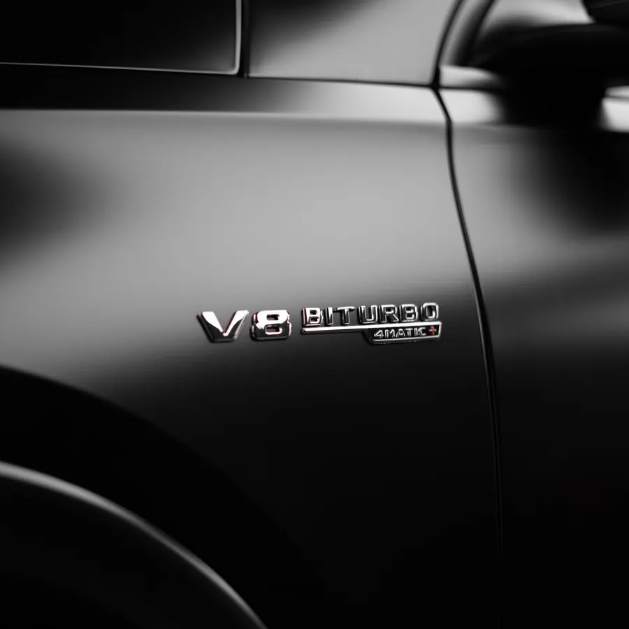 V8 Biturbo badge — gloss detail