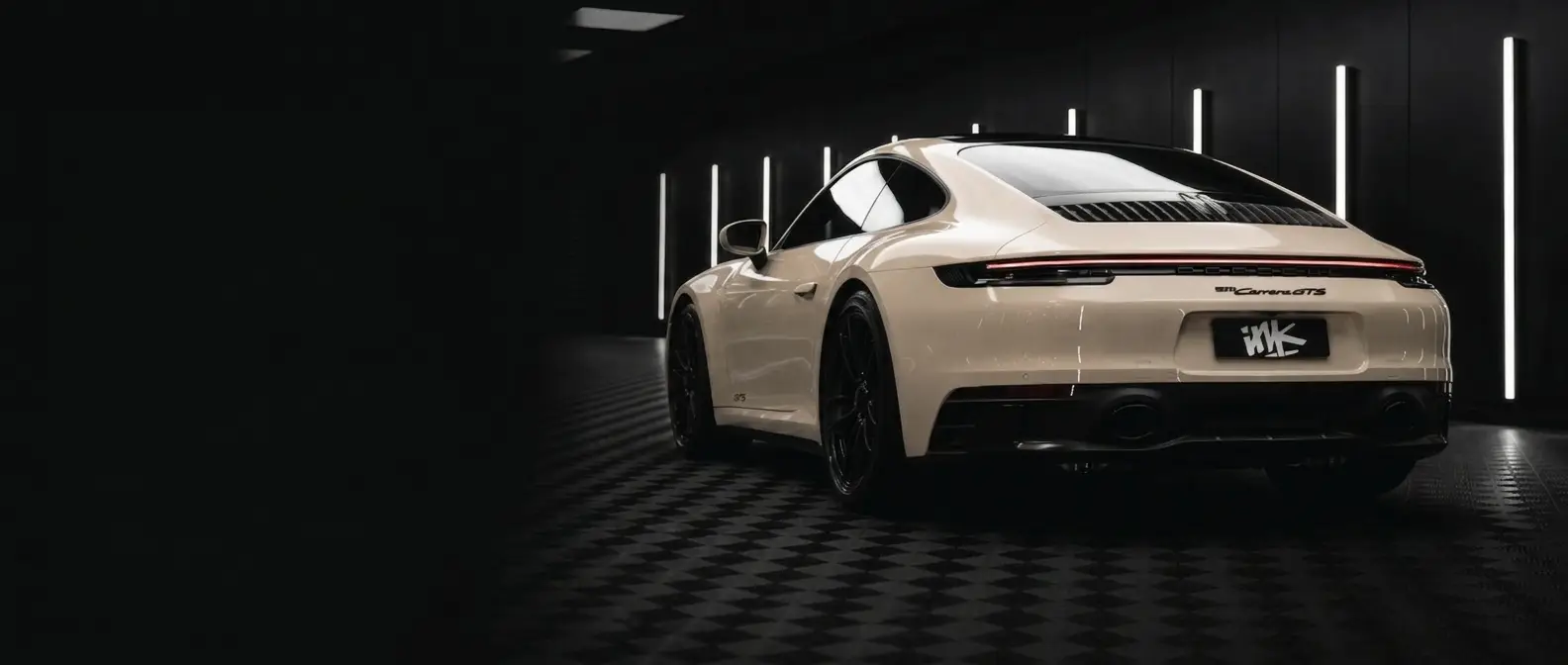 Porsche 911 rear three-quarter, studio lighting